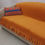 サムネイル： Four-Seater Sofa Cover: Customizable Durable Orange Seat Cover with Pleats