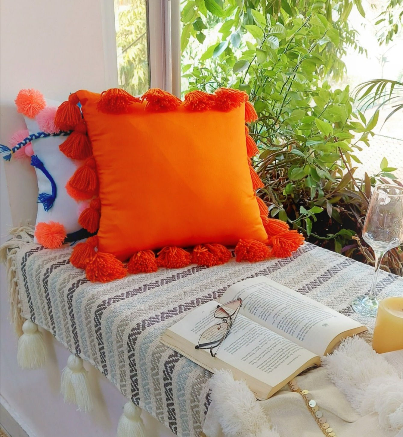 Add a pop of color with bright orange cushion cover