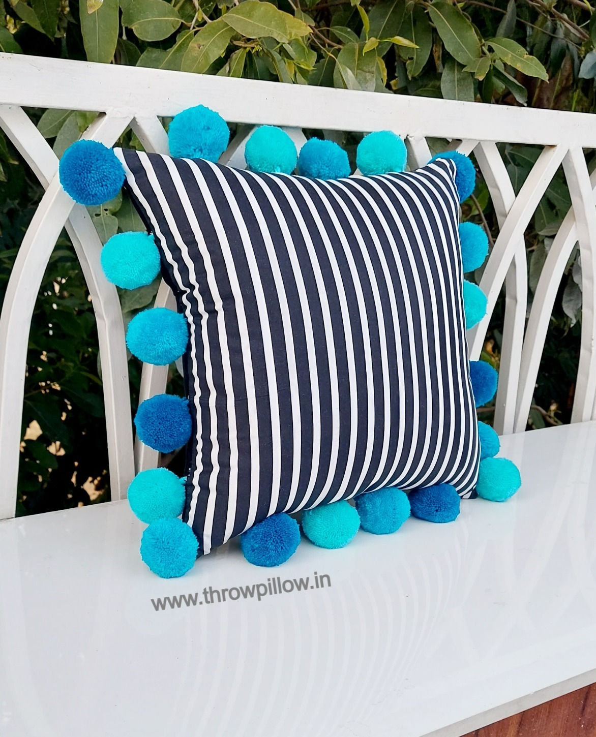 Add a touch of boho chic to your home with our pom pom cushion cover