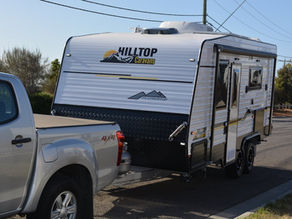 Vehicle with a Hilltop Caravan hitched