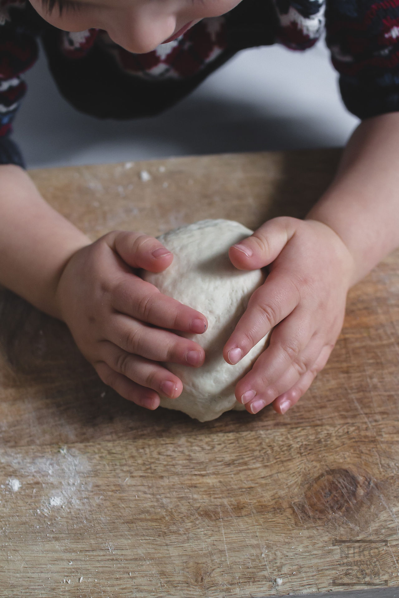 Making authentic Italian pizza baby hands
