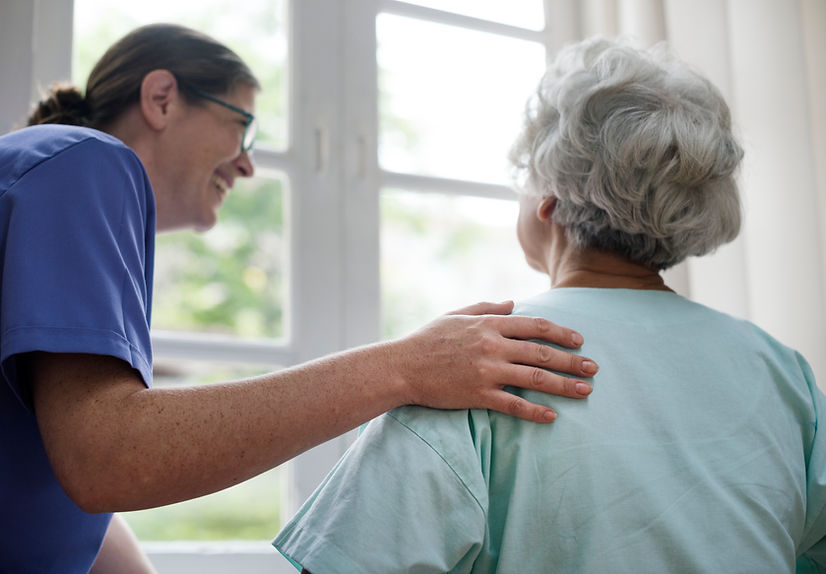 nurse-taking-care-old-woman.jpg
