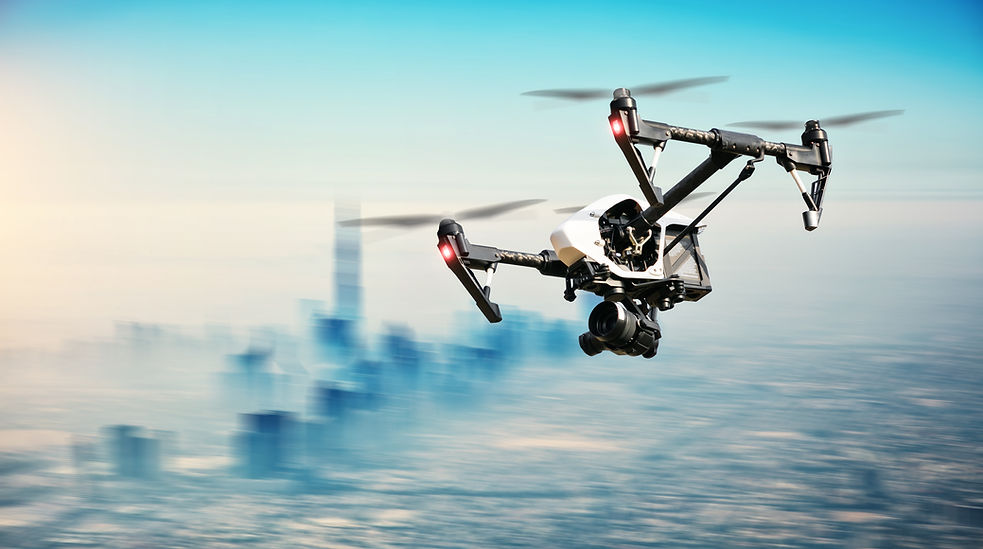 Drone flying aboveDubai city panorama in blur motion.jpg