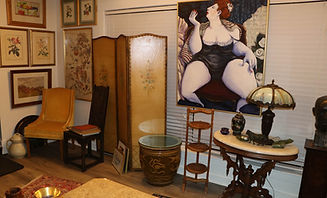 Vintage foldign screen and large painted portrait.