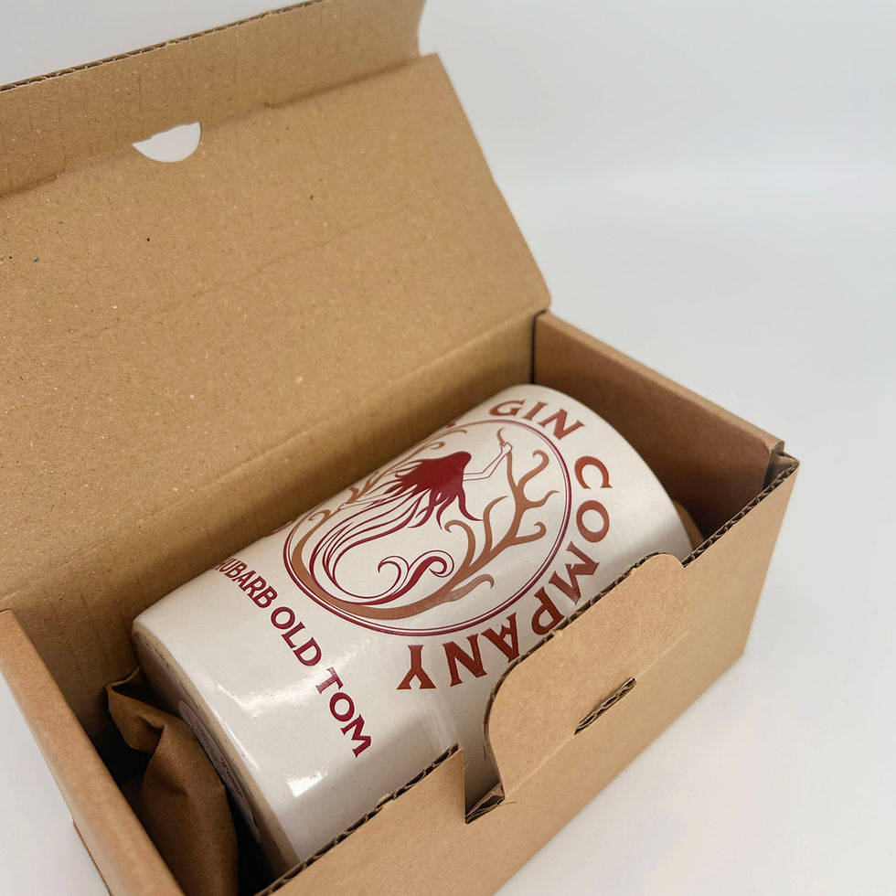 Rhubarb Old Tom eco soy wax recycled bottle candle in a gift box