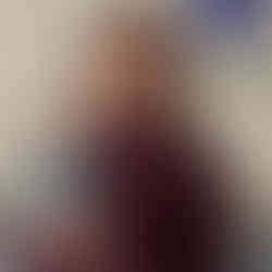 Erin Watt holding award winning Aatta Gin