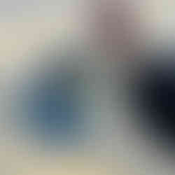 Sule Skerry Gin held over an Orkney loch