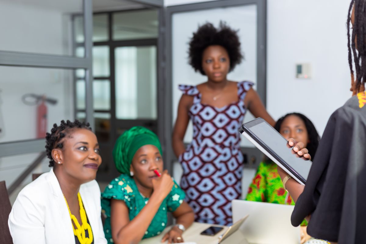 Black business owner receiving strategic guidance from a small business advisor at King's Dream Business Consulting in Tacoma and Seattle