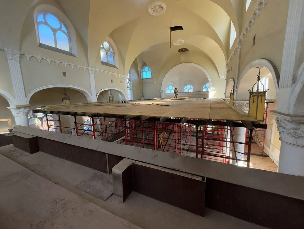 The scaffolding supports a 'dancefloor' 20 ft. in the air. Work can now begin on restoring the ceiling. This is the only time a dancefloor is allowed in a church!