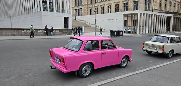 Pink Trabant car on a Berlin street near Museum Island