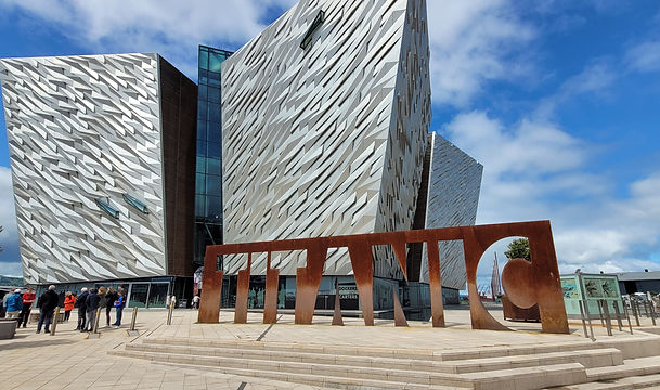 Titanic Belfast museum with large rusted steel sign