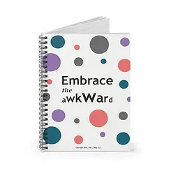 Spiral notebook with 'Embrace the awkward' and polka dots.