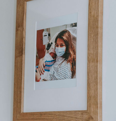 Framed photo of mother and newborn baby