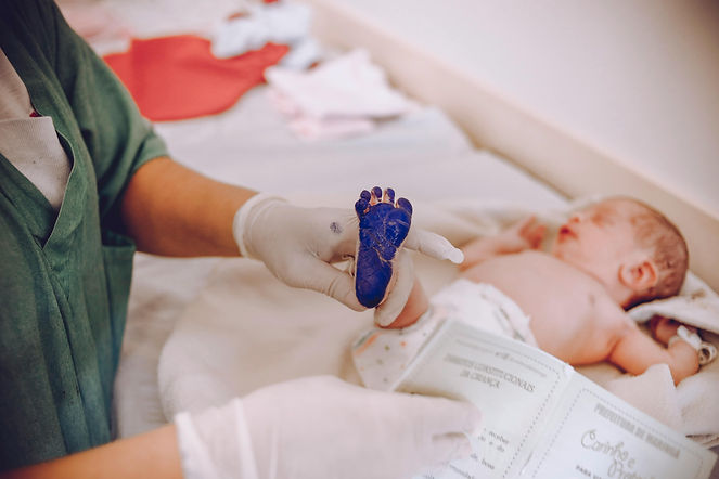 Baby With Ink On Foot.jpg