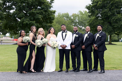 Bridal party smiling for group portrait in Centennial Park