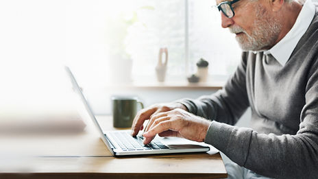 Man typing on computer close up.jpg