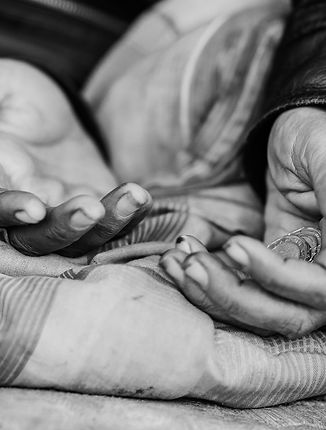 homeless-woman-holding-hands-out-for-hel