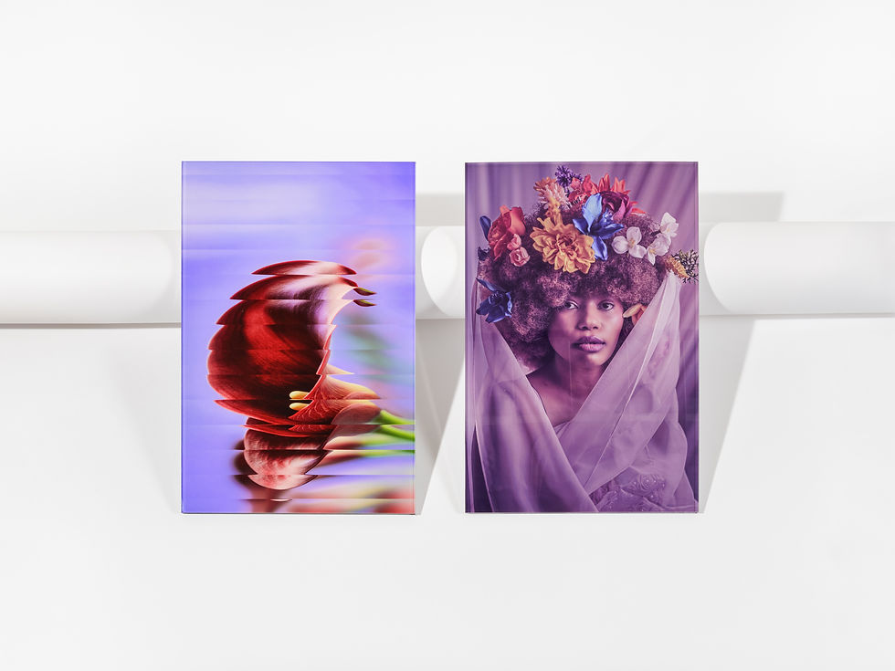 Two colorful Acrylic Prints on a white wall: a red abstract flower on purple and a woman with a flower crown and veil