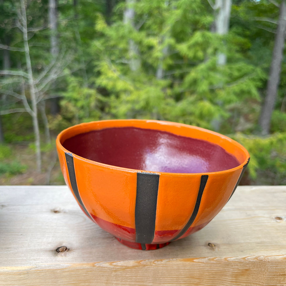 Small plum, orange, red striped bowl