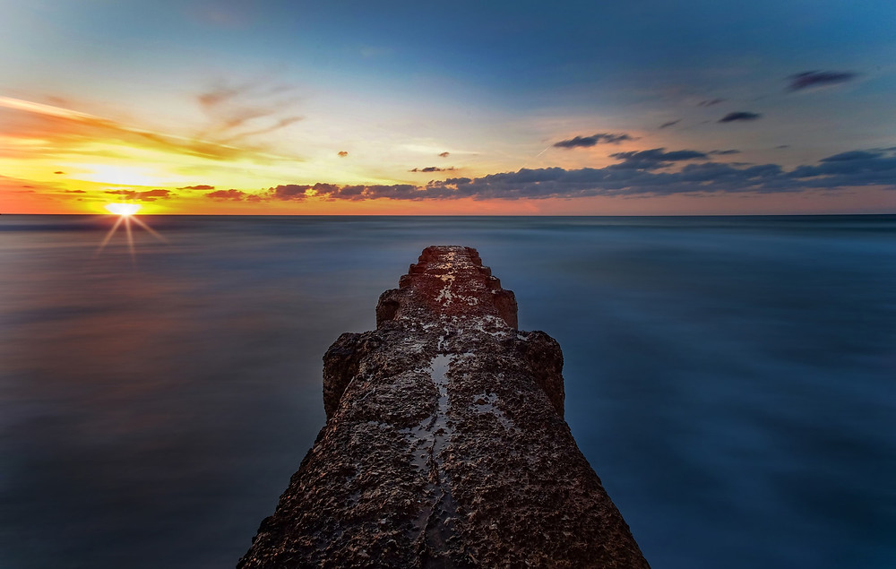 Tel Aviv beach sunset; photo credit Zoltan Tasi