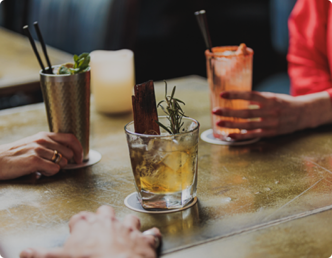 non-alcoholic rum cocktail, mood enhancing cocktail, drink with rosemary garnish, what non-alcoholic drink to order in a bar.
