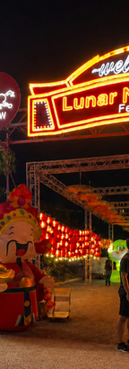 Illuminated entrance archway and signage rigging at a Lunar New Year Festival, with zodiac displays and lanterns, installed by The Scaffold Company