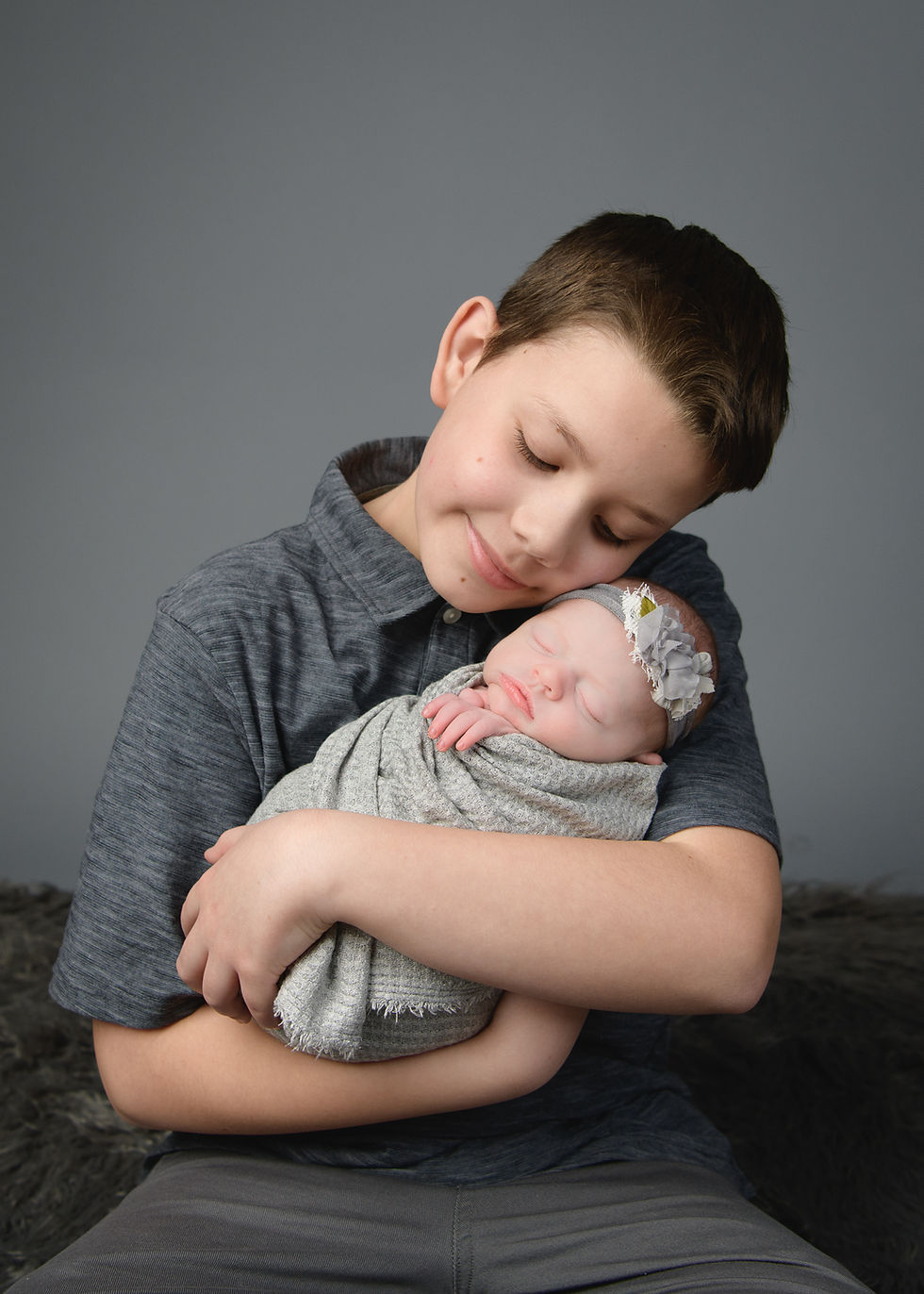 big brother with infant picture