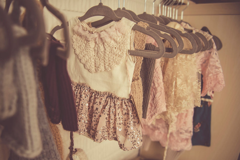 close up of newborn outfits
