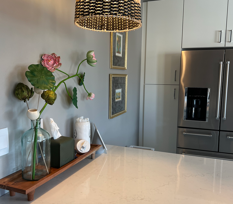 Take a builders grade $50 pendant light and switch it out with a unique basket lamp, and create a statement other than...boring!