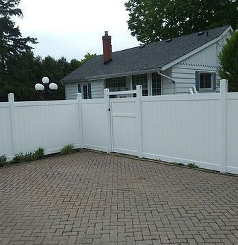White vinyl fence installed by Barrie fence builders
