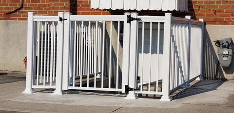 White vinyl fence installed by contractors