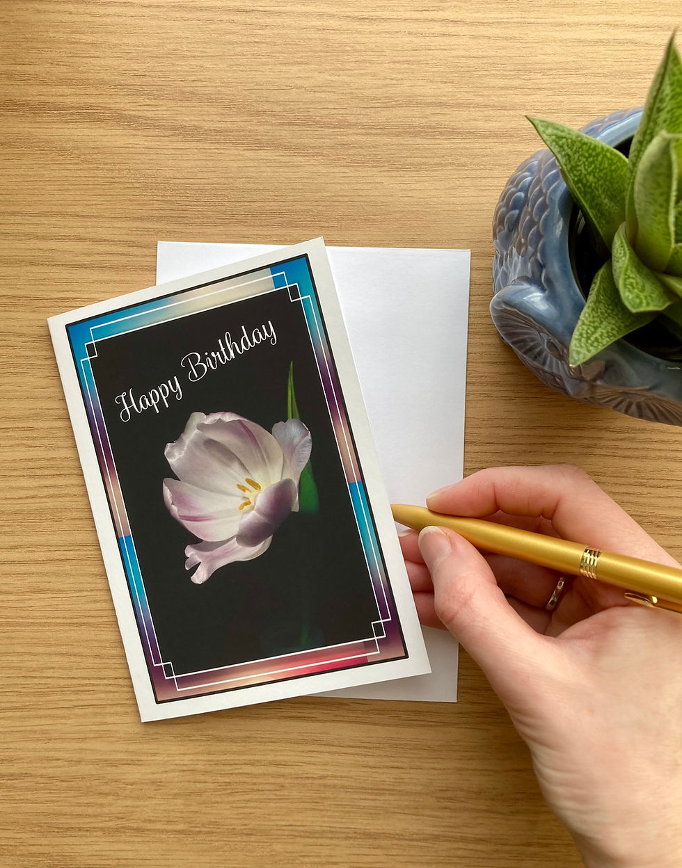 Thumbnail: Hand writing Happy Birthday card with tulip