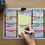 Thumbnail: Photo of Weekly Calendar on Table with Hand Holding Marker on Planner, Marker Cap on Top of Planner, and Ceramic Owl Pot with Plant in Top Left Corner