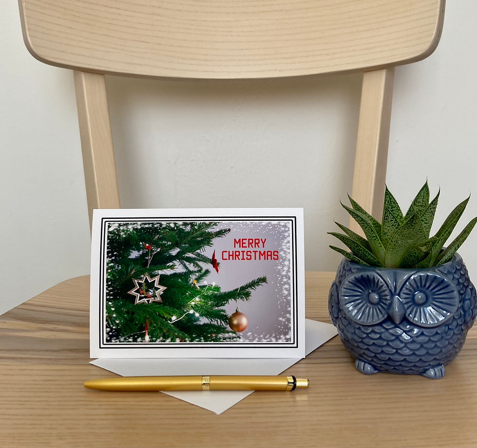 Thumbnail: Christmas card design with tree and "Merry Christmas" text on the chair