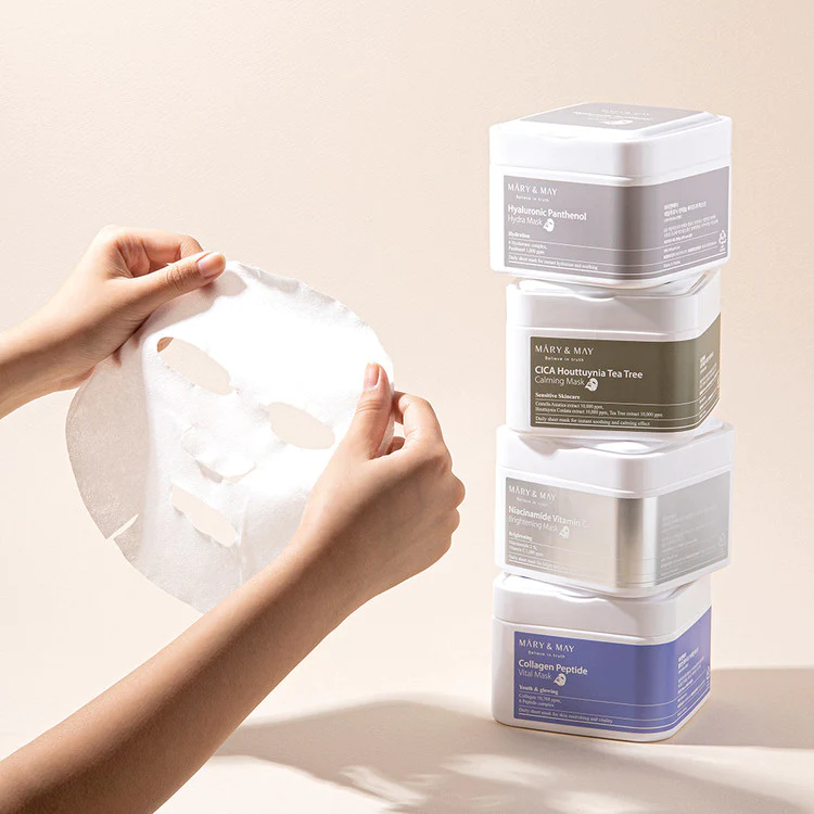 Miniature : Détail du tissu en cellulose des MARY & MAY Collagen Peptide Vital Mask