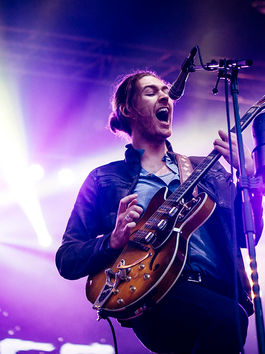 Hozier rocking out on tour