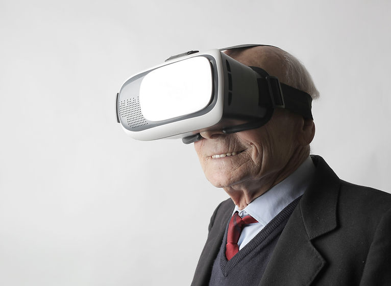 senior-man-using-vr-goggles-in-studio-38