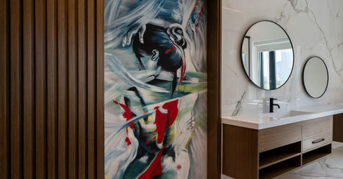 modern bathroom in Dubai with marble walls glass partition and minimalist design