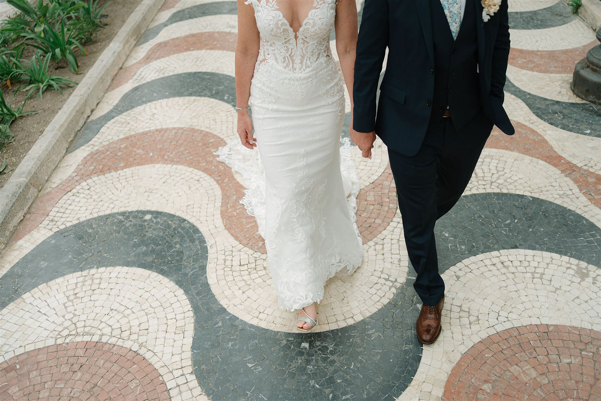 Bride and Groom on Alicante famous red white and black mosaic promenade