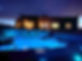 The hot tub at night with Hacienda in the background