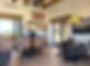 Tables, chairs, artwork, coffee station and views of The Great Room