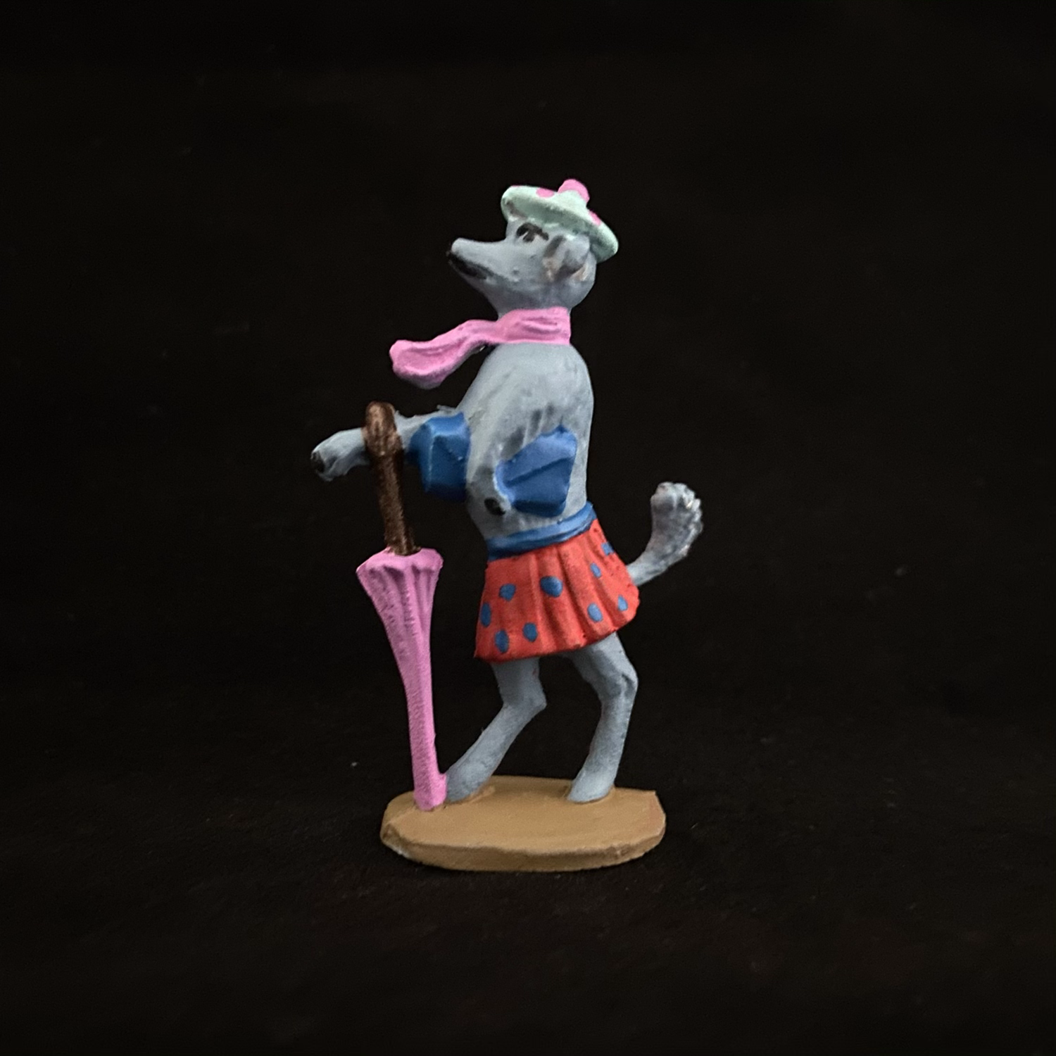 C12. Performing Dog with brolly and clothes