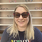 lady wearing black and red statement sunglasses