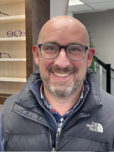 man wearing frames with black rim 