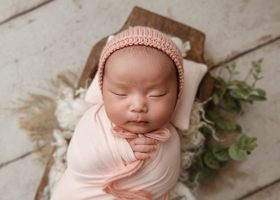 Andover newborn photographer, swaddled baby girl in pink