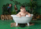 Bath splash after jungle cake smash photoshoot