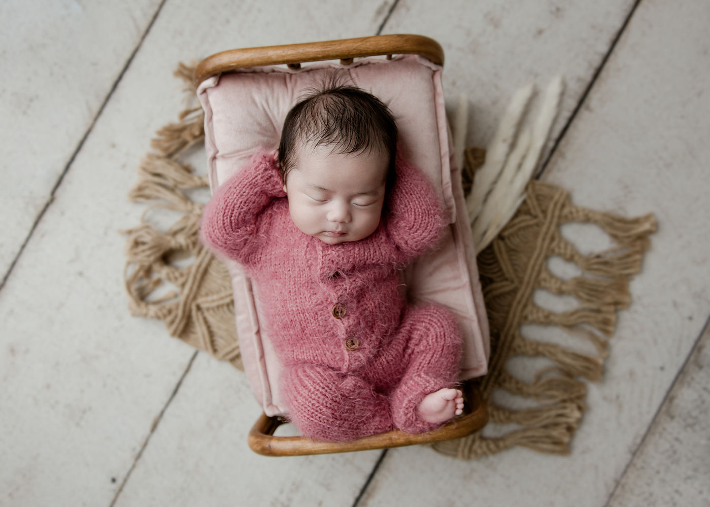 Andover newborn baby photographer, girl in pink romper