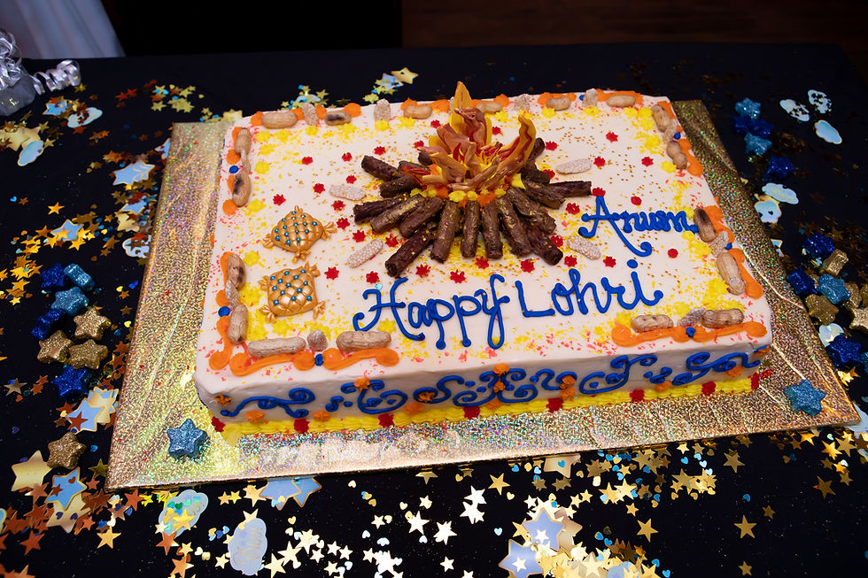 Indian birthday photographer captures image of birthday lohri cake.