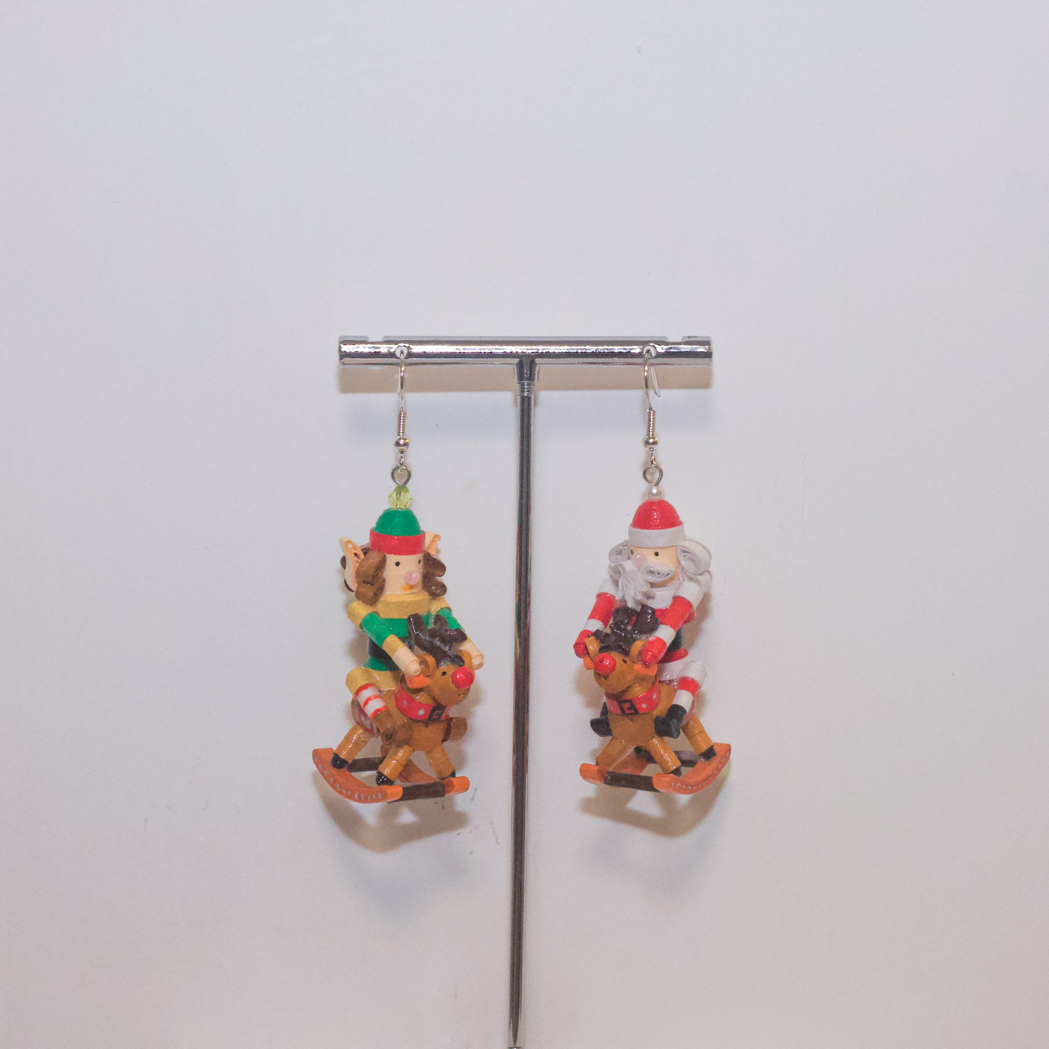 The Christmas Nutcracker on Rocking Reindeer Ornament Earrings