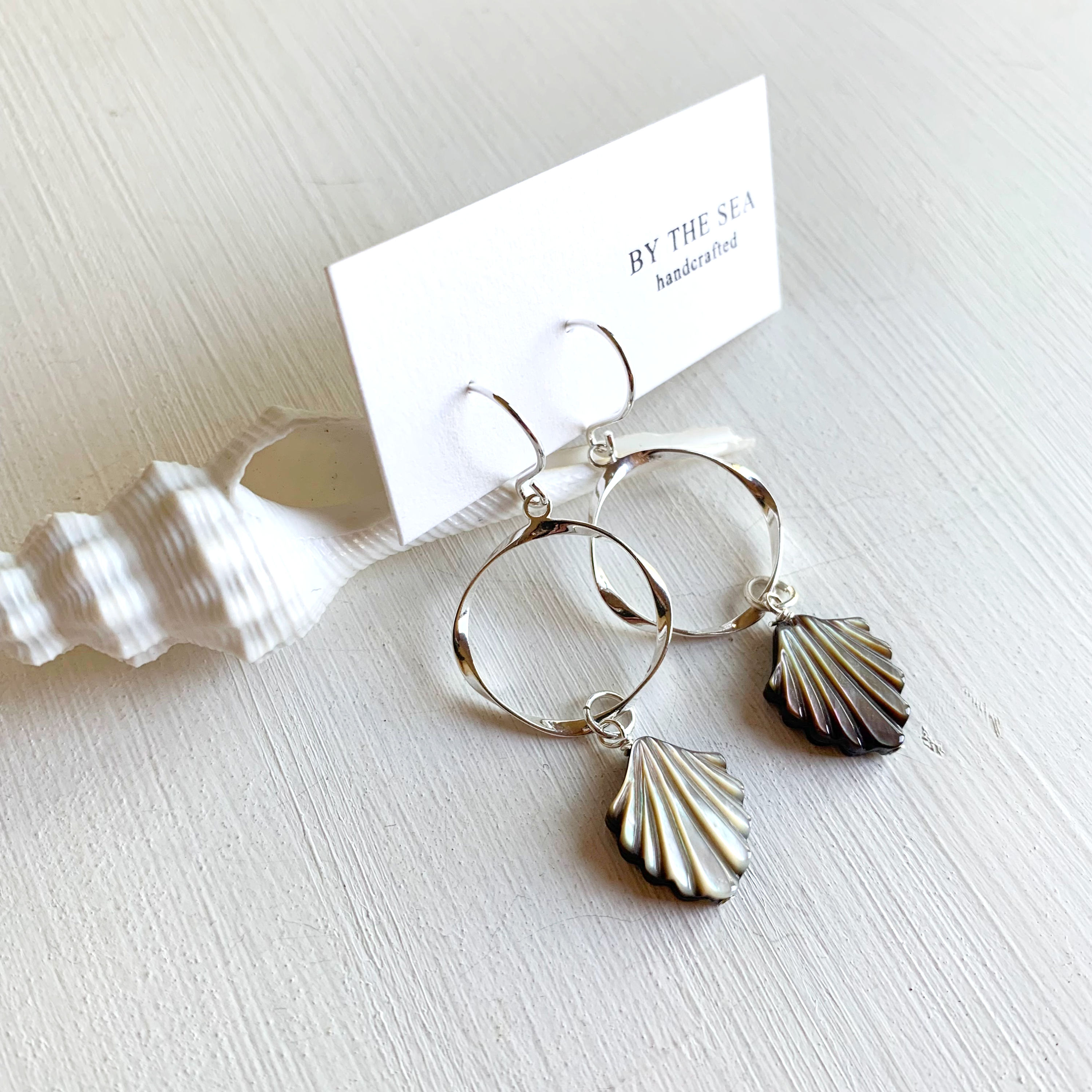 Curving shell silver pierce